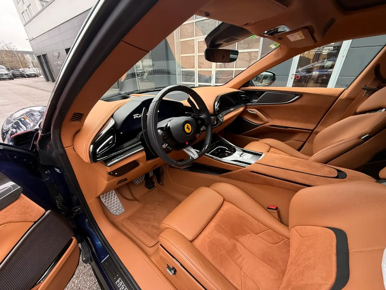 Ferrari Purosangue 2024, vista trasera — Sports Car Rental Barcelona, Barcelona. Ferrari Purosangue en Barcelona El Ferrari Purosangue 2024 se ofrece para alquiler en…